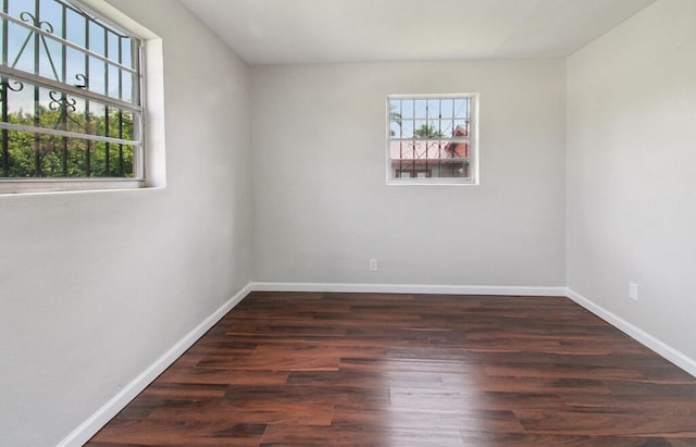 empty room with wood-type flooring