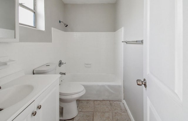 full bathroom with tasteful backsplash, tub / shower combination, tile patterned floors, toilet, and vanity