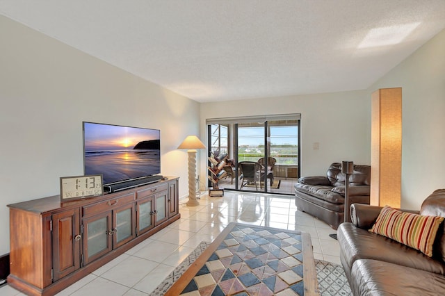 tiled living room with a textured ceiling