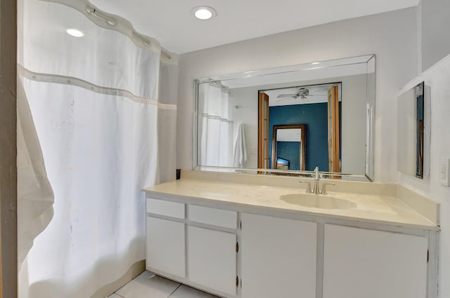 bathroom with vanity and tile patterned flooring