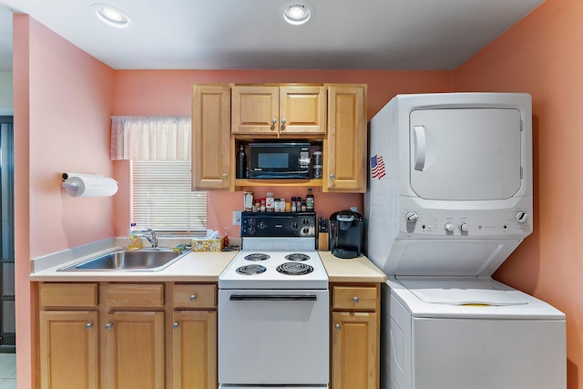 kitchen with sink, stacked washer / dryer, white electric stove, and light brown cabinetry