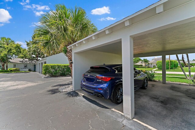 view of car parking featuring a carport