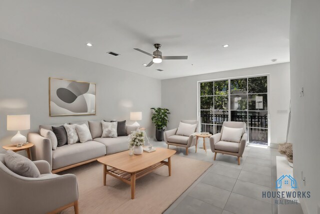 tiled living room featuring ceiling fan