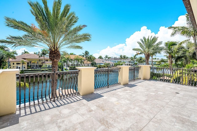 view of patio featuring a water view