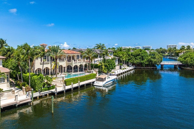 view of dock featuring a water view and a patio area