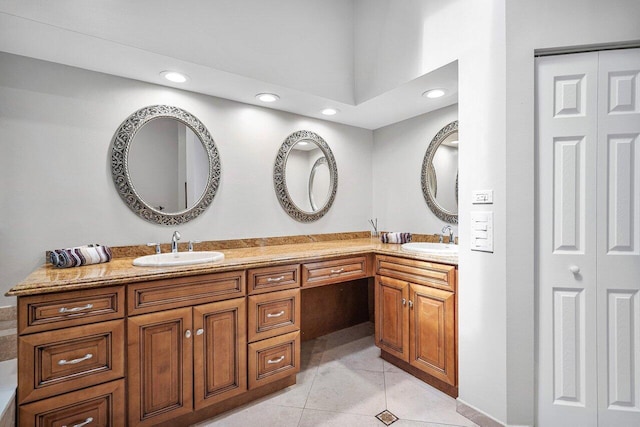 bathroom featuring vanity and tile patterned flooring