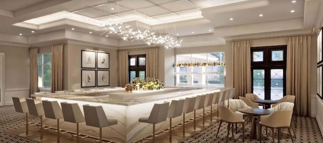 bar with light stone countertops, coffered ceiling, and french doors