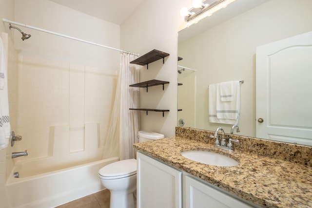 full bathroom with tile patterned floors, vanity, toilet, and shower / bath combo with shower curtain