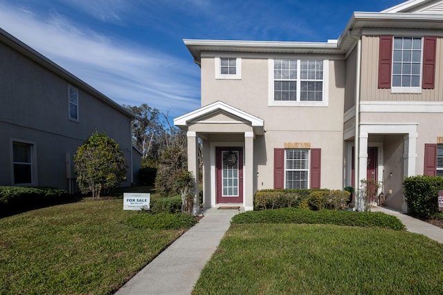 view of front facade featuring a front yard