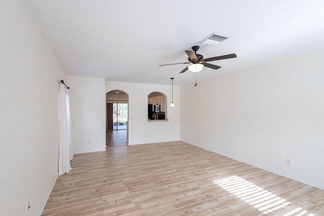 interior space featuring light hardwood / wood-style floors and ceiling fan