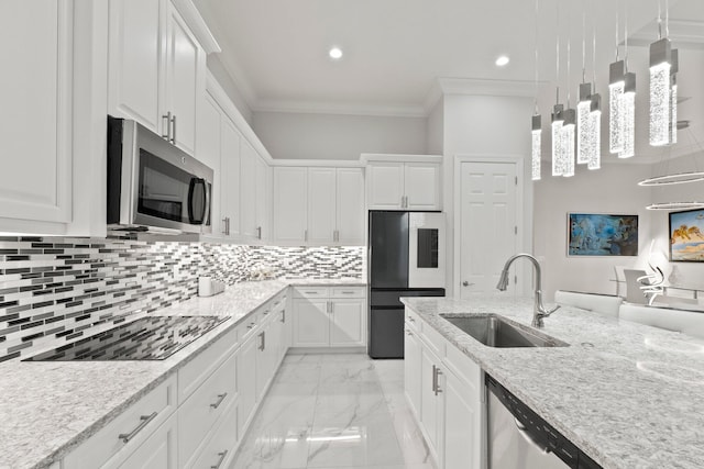 kitchen featuring light tile patterned floors, backsplash, appliances with stainless steel finishes, sink, and ornamental molding