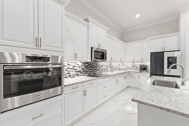 kitchen featuring light tile patterned floors, stainless steel appliances, tasteful backsplash, and sink