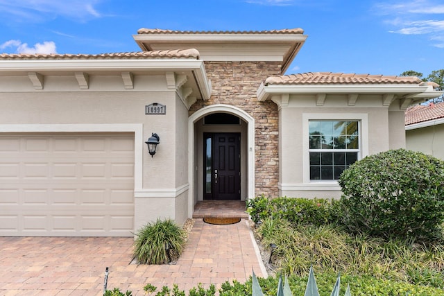 property entrance featuring a garage