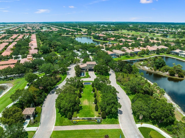 drone / aerial view with a water view