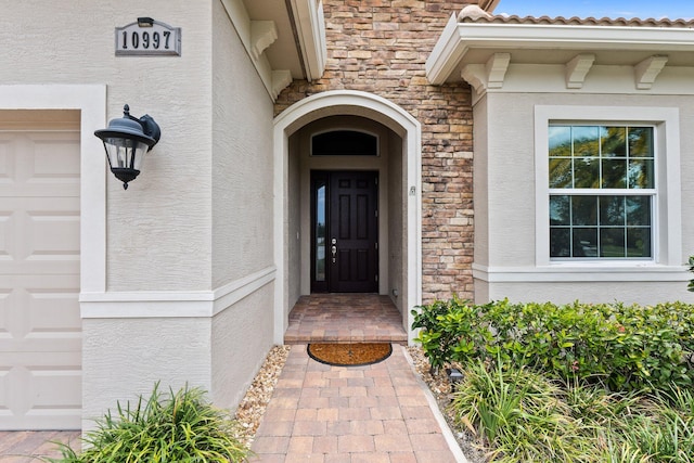 property entrance featuring a garage