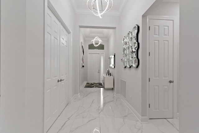 hall featuring ornamental molding and light tile patterned floors