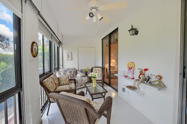 sunroom / solarium with ceiling fan