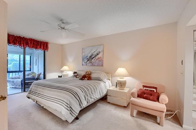 bedroom featuring carpet, access to exterior, baseboards, and ceiling fan