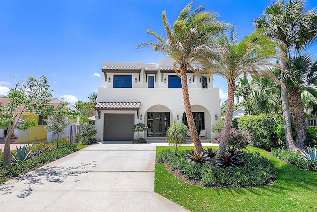 226 NE 11th St, Delray Beach, FL 33444 - rear view of house featuring a patio area, stucco siding, and an in-ground hot tub