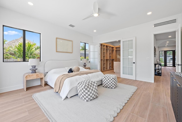 226 NE 11th St, Delray Beach, FL 33444 - bathroom with tile walls, a freestanding bath, a tile shower, tile patterned flooring, and recessed lighting