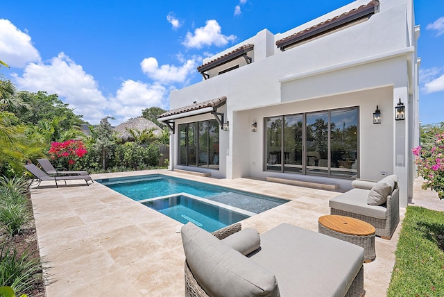 226 NE 11th St, Delray Beach, FL 33444 - mediterranean / spanish home with a tiled roof, an attached garage, driveway, and stucco siding