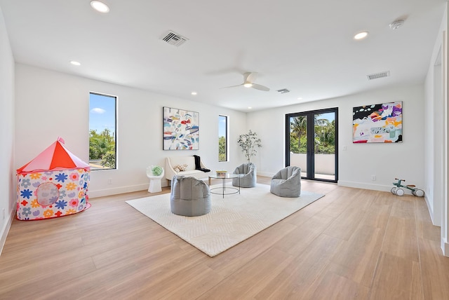 226 NE 11th St, Delray Beach, FL 33444 - spare room featuring light wood-style flooring, a ceiling fan, french doors, baseboards, and recessed lighting