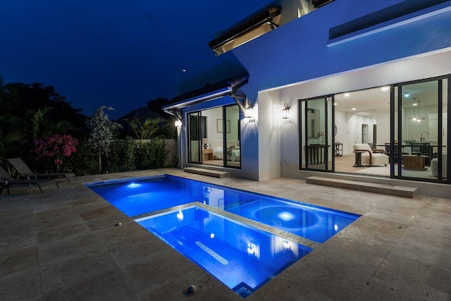 226 NE 11th St, Delray Beach, FL 33444 - mediterranean / spanish-style house featuring a balcony, stucco siding, driveway, a tiled roof, and fence