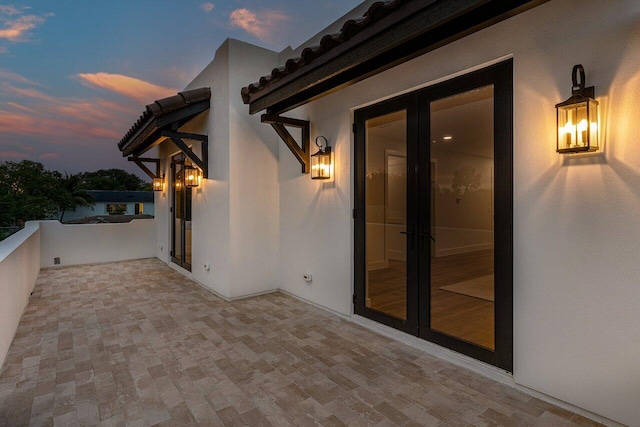 226 NE 11th St, Delray Beach, FL 33444 - garage with a garage door opener, electric panel, and baseboards