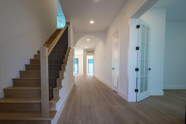 hall featuring hardwood / wood-style flooring