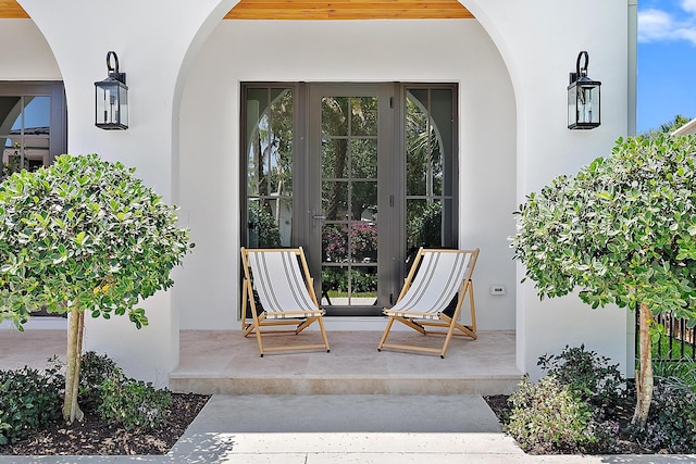 226 NE 11th St, Delray Beach, FL 33444 - stairway featuring arched walkways, wood finished floors, recessed lighting, and baseboards