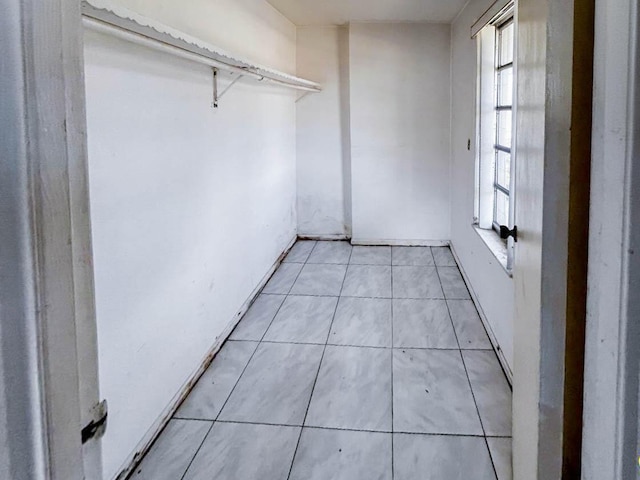 interior space featuring light tile patterned floors