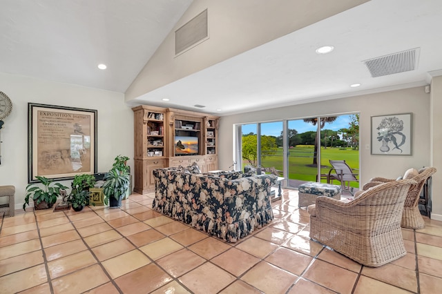 tiled living room with vaulted ceiling