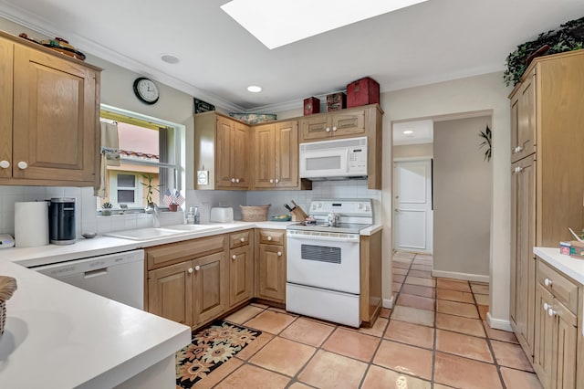 kitchen with sink, decorative backsplash, white appliances, and light tile patterned floors