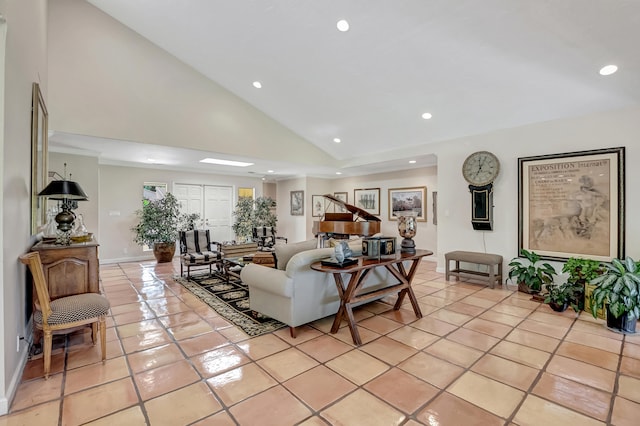 tiled living room featuring high vaulted ceiling