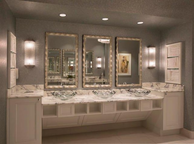 bathroom with vanity and tile patterned floors