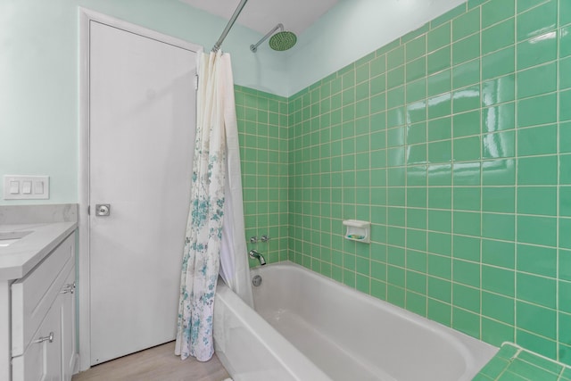 9531 Birdwood St, Palm Beach Gardens, FL 33410 - bathroom with wood finished floors, shower / tub combo with curtain, and vanity