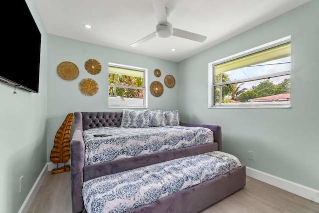 9531 Birdwood St, Palm Beach Gardens, FL 33410 - bedroom featuring wood finished floors, baseboards, a ceiling fan, and recessed lighting
