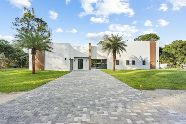 view of front of home with a front yard