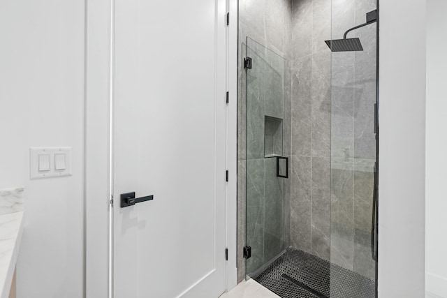 bathroom with an enclosed shower