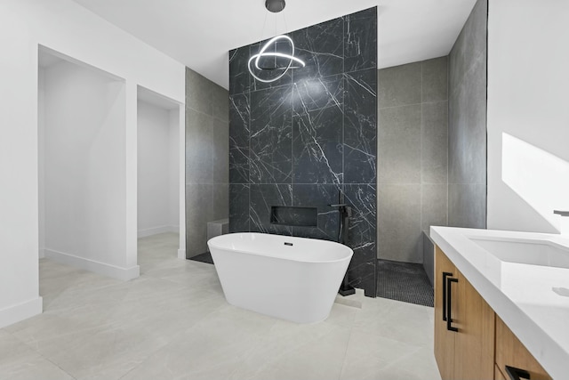 bathroom featuring vanity, independent shower and bath, and tile walls