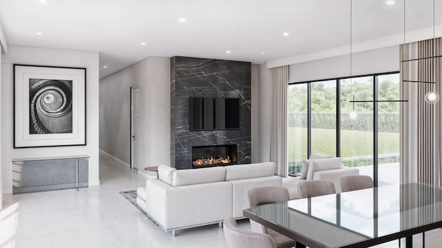 living room with light tile patterned flooring and a high end fireplace