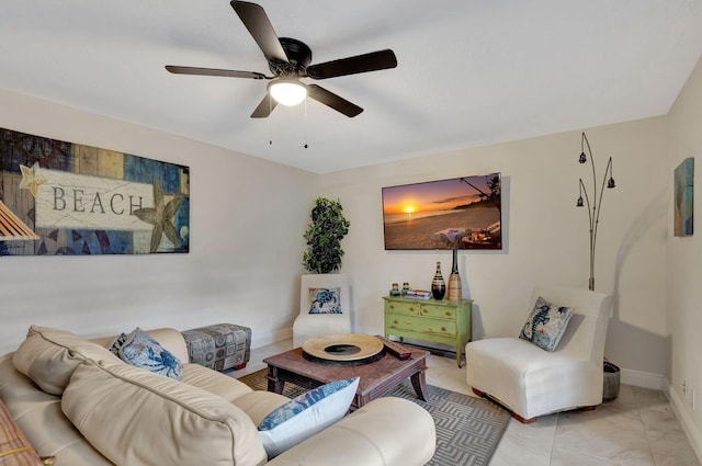 living room featuring ceiling fan and light tile patterned flooring