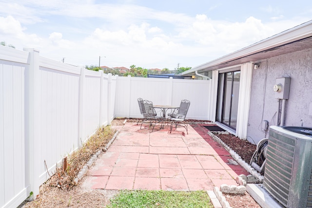 view of patio featuring central AC