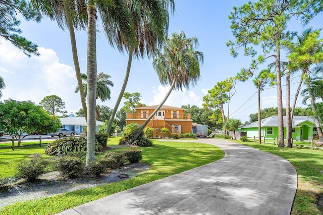 view of front of home with a front lawn