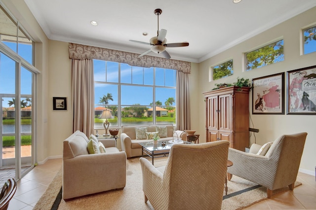 tiled living room with ceiling fan and ornamental molding