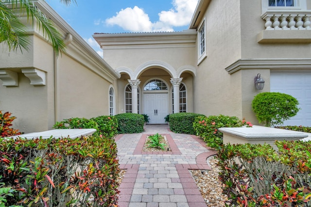 property entrance with a garage