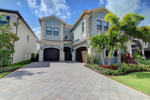 view of front of home with a garage