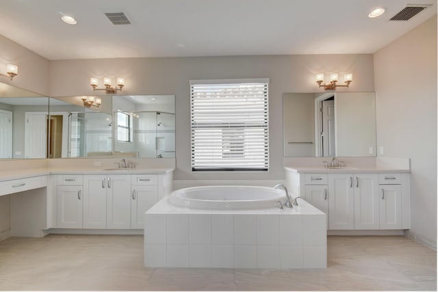 bathroom featuring vanity and plus walk in shower