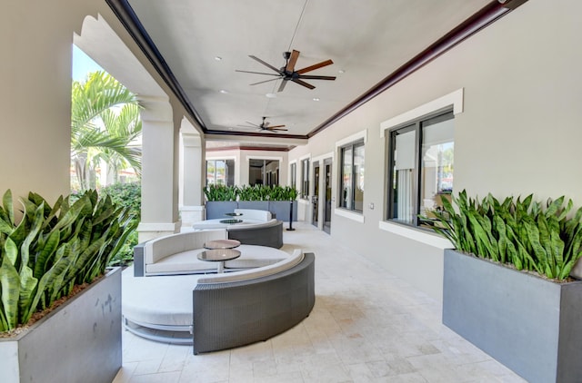 view of patio featuring ceiling fan