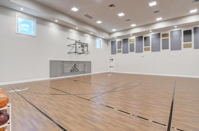 view of basketball court featuring plenty of natural light